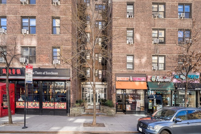 54 E 8th St Unit 6-L, New York City, NY 10003 - view of apartment building / complex featuring cooling unit