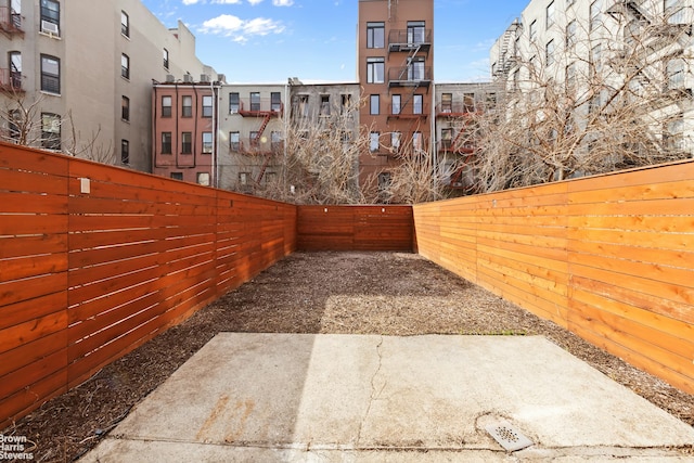 view of yard with a fenced backyard