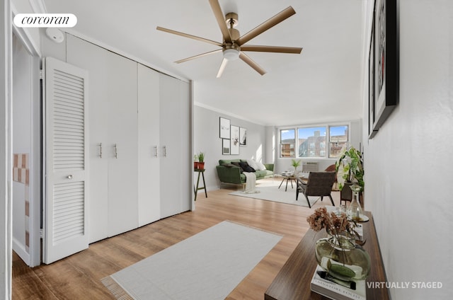 1655 Flatbush Ave Unit A602, New York City, NY 11210 - sitting room with wood finished floors, ceiling fan, and crown molding