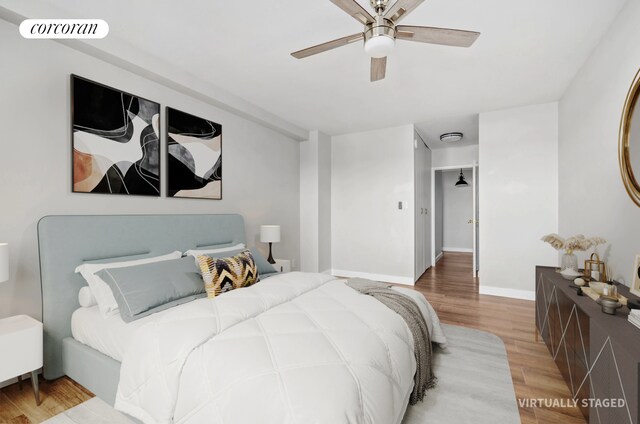 1655 Flatbush Ave Unit A602, New York City, NY 11210 - bedroom featuring wood finished floors, a ceiling fan, and baseboards