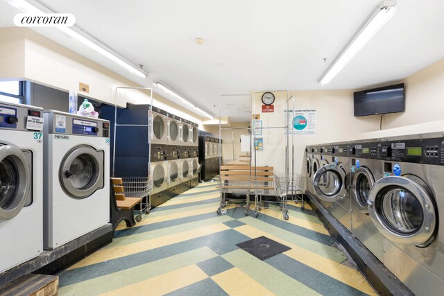 1655 Flatbush Ave Unit A602, New York City, NY 11210 - shared laundry with washing machine and dryer, tile patterned floors, and stacked washer / drying machine