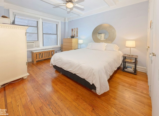 155 E 91st St Unit 3D, New York City, NY 10128 - bedroom with radiator, ceiling fan, beamed ceiling, light wood finished floors, and baseboards