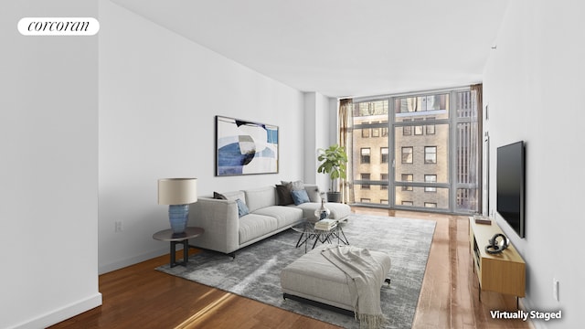 1600 Broadway Unit 17A, New York City, NY 10019 - living area featuring floor to ceiling windows and wood finished floors