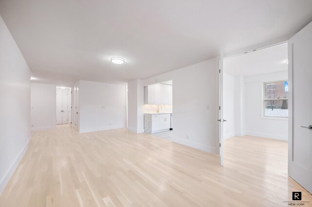 3777 Independence Ave Unit 2-B, New York City, NY 10463 - unfurnished living room featuring light wood finished floors and baseboards