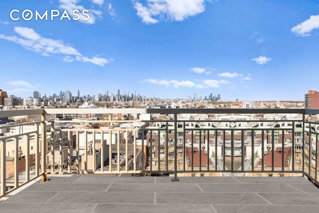balcony featuring a city view