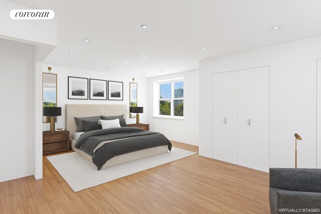 bedroom featuring recessed lighting, a closet, light wood finished floors, and visible vents