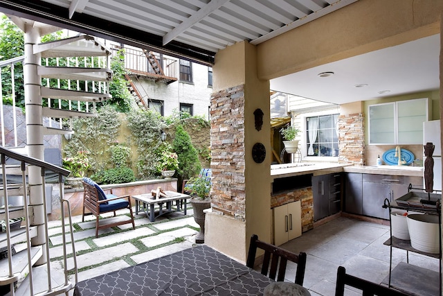 34 Fort Charles Place, New York City, NY 10463 - view of patio / terrace featuring an outdoor kitchen