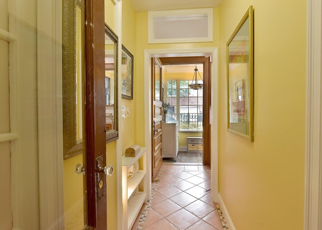 34 Fort Charles Place, New York City, NY 10463 - hallway with light tile patterned floors and baseboards