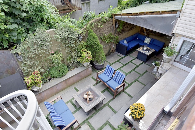 34 Fort Charles Place, New York City, NY 10463 - view of patio featuring an outdoor living space with a fire pit