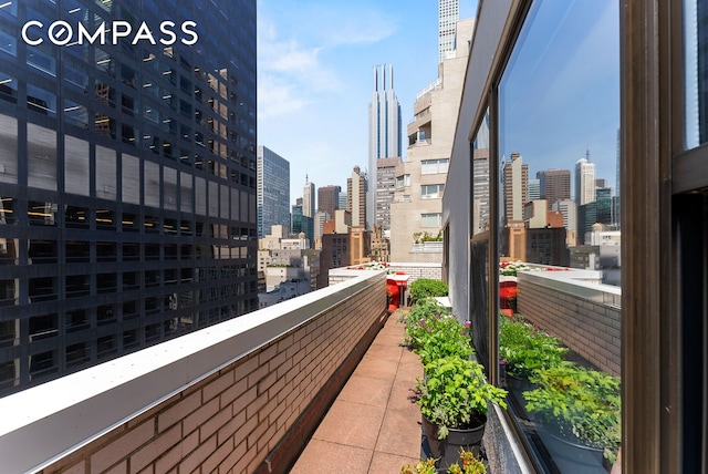 balcony featuring a city view