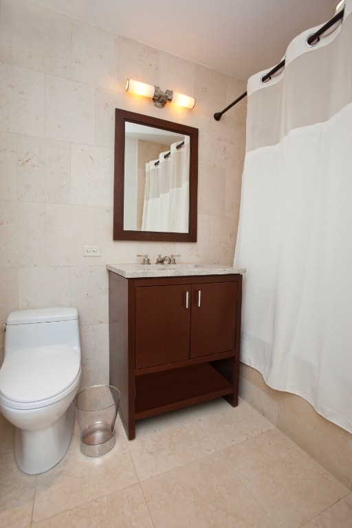 100 Riverside Blvd Unit 11J, New York City, NY 10069 - bathroom with vanity, tile patterned flooring, and a shower with shower curtain