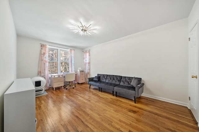79-10 34th Ave Unit 3S, New York City, NY 11372 - sitting room featuring hardwood / wood-style floors