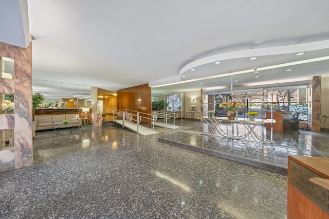 79-10 34th Ave Unit 3S, New York City, NY 11372 - building lobby featuring recessed lighting
