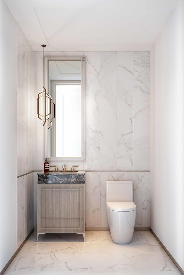 251 W 91st St Unit 16-C, New York City, NY 10024 - bathroom featuring marble finish floors, toilet, and vanity