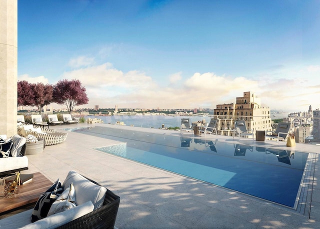 251 W 91st St Unit 16-C, New York City, NY 10024 - view of pool featuring a swimming pool, a patio, a city view, and a water view
