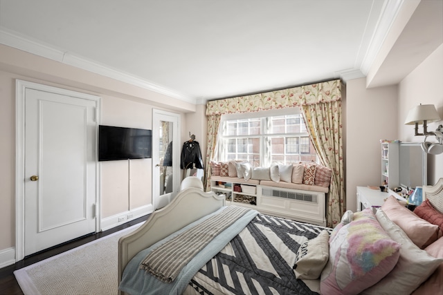 333 E 68th Street Penthouse, New York City, NY 10065 - bedroom with ornamental molding, wood finished floors, and baseboards