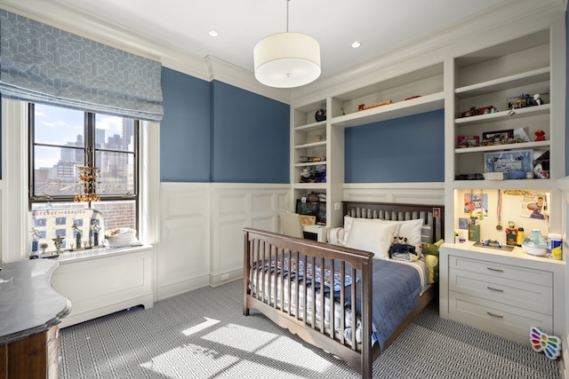 333 E 68th Street Penthouse, New York City, NY 10065 - bedroom featuring light carpet, crown molding, a view of city, and a decorative wall