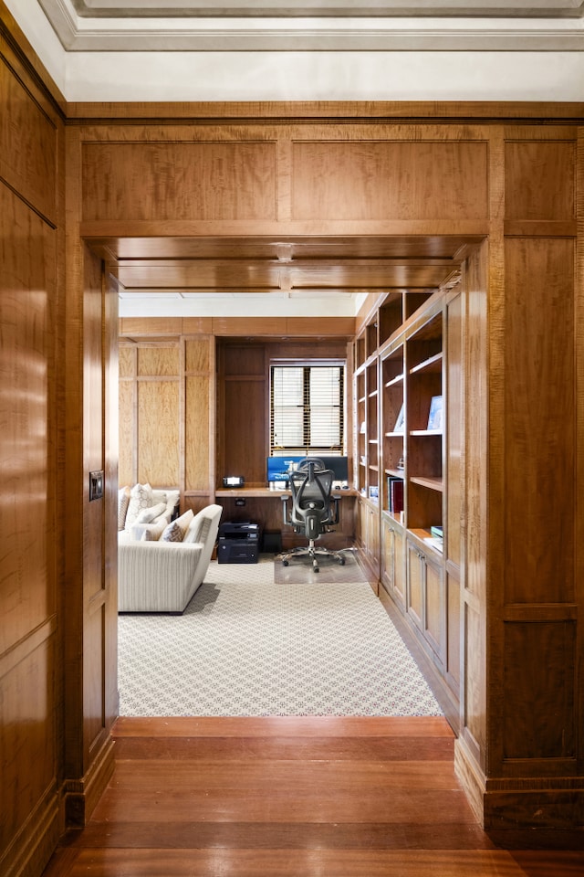 333 E 68th Street Penthouse, New York City, NY 10065 - home office featuring wooden walls, wood finished floors, and crown molding