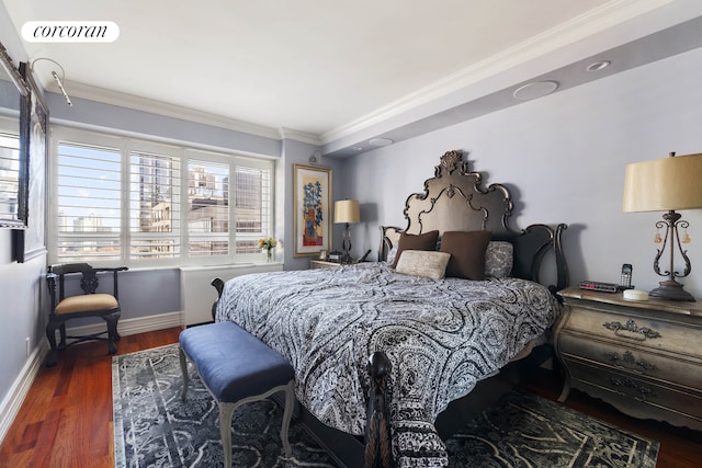 bedroom featuring baseboards, visible vents, ornamental molding, and wood finished floors
