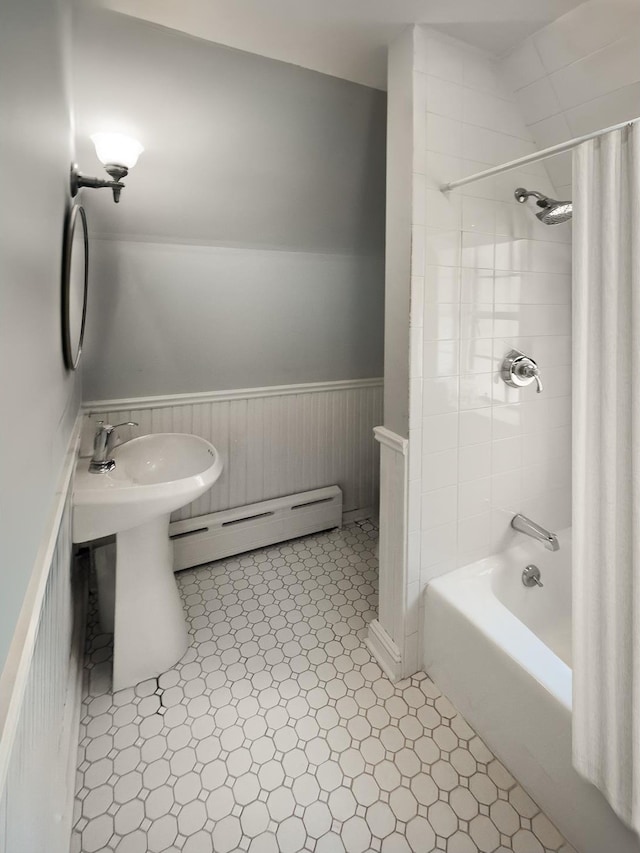 2501 Palisade Ave Unit H2, New York City, NY 10463 - full bath featuring a baseboard heating unit, a wainscoted wall, and shower / bath combo
