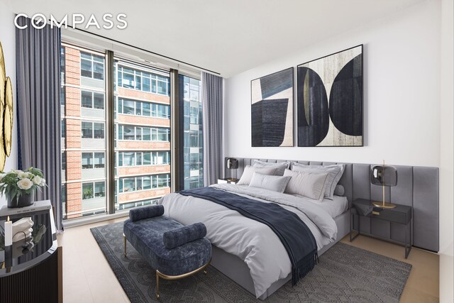 520 W 28th St Unit 18, New York City, NY 10001 - bedroom with floor to ceiling windows and multiple windows