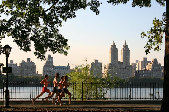 property's view of city with a water view