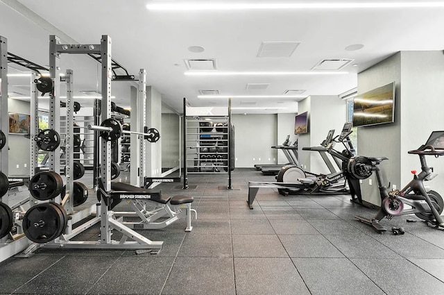 exercise room featuring visible vents