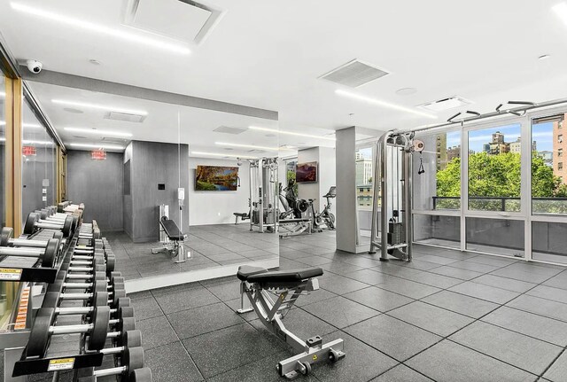exercise room featuring visible vents