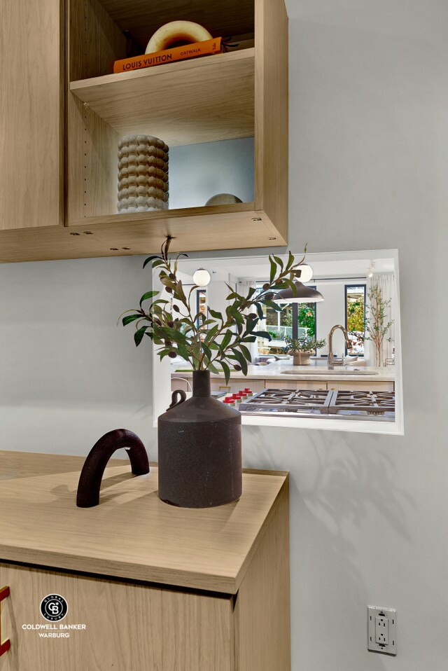 212 E 95th St Unit 2Ab, New York City, NY 10128 - detailed view of stainless steel gas cooktop and a sink