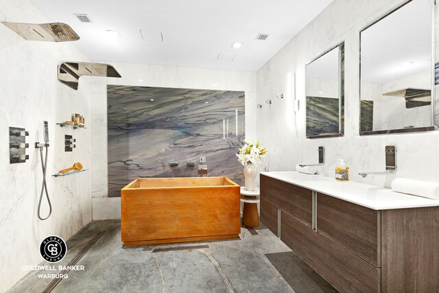 212 E 95th St Unit 2Ab, New York City, NY 10128 - bathroom with double vanity and a marble finish shower