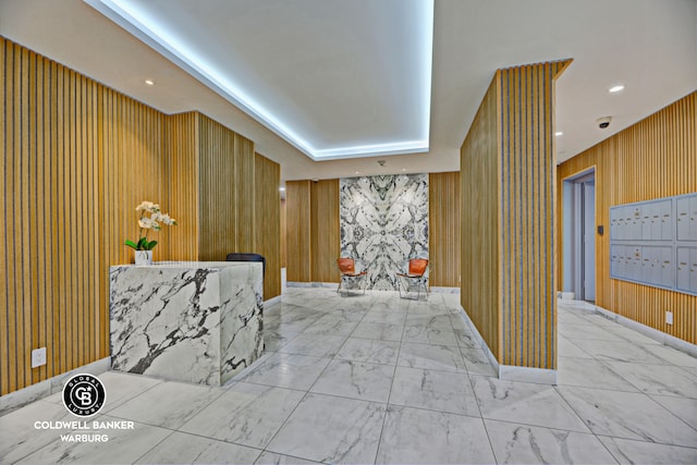 212 E 95th St Unit 2Ab, New York City, NY 10128 - reception area featuring mail area, wooden walls, and recessed lighting