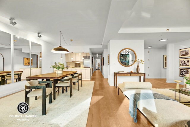 212 E 95th St Unit 2Ab, New York City, NY 10128 - dining area with light wood-style flooring and baseboards