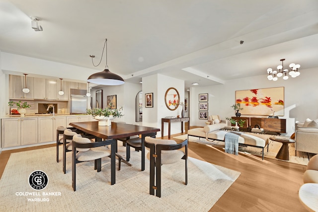 212 E 95th St Unit 2Ab, New York City, NY 10128 - dining space featuring light wood-style floors, a chandelier, baseboards, and recessed lighting