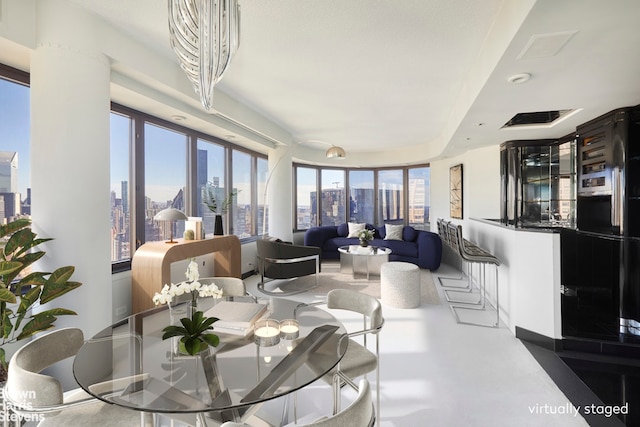 330 E 38th St Unit 51Ef, New York City, NY 10016 - dining space with a view of skyline