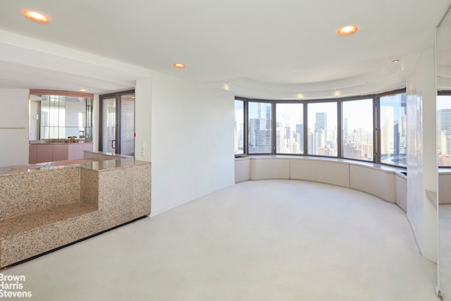 330 E 38th St Unit 51Ef, New York City, NY 10016 - unfurnished sunroom with a skyline view