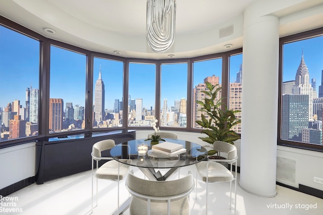 330 E 38th St Unit 51Ef, New York City, NY 10016 - dining room featuring a skyline view