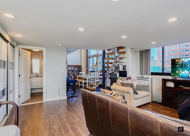 10 Bay St Unit 1-A, New York City, NY 10301 - living area with recessed lighting, wood finished floors, baseboards, and stairway