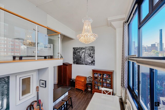 10 Bay St Unit 1-A, New York City, NY 10301 - dining area featuring a chandelier, dark wood finished floors, and a view of city