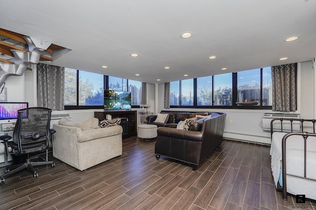 10 Bay St Unit 1-A, New York City, NY 10301 - living area featuring a baseboard radiator, recessed lighting, healthy amount of natural light, and dark wood finished floors