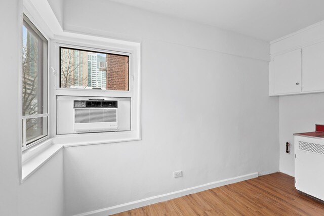 235 Adams St Unit 6A, New York City, NY 11201 - interior space featuring cooling unit and wood finished floors