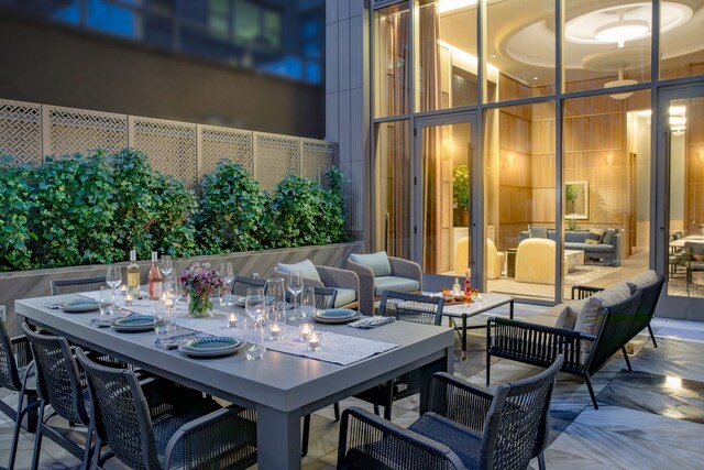 view of patio / terrace with an outdoor living space and outdoor dining space