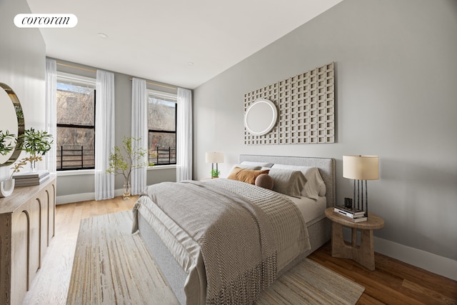 680-682 Hendrix St, New York City, NY 11207 - bedroom featuring light wood finished floors and baseboards