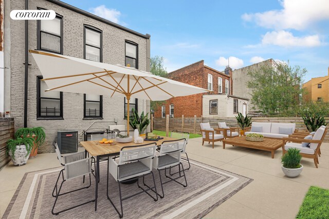 680-682 Hendrix St, New York City, NY 11207 - view of patio with an outdoor living space, fence, outdoor dining space, and cooling unit
