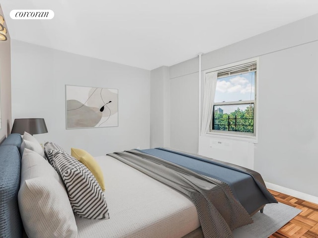 bedroom with visible vents and baseboards