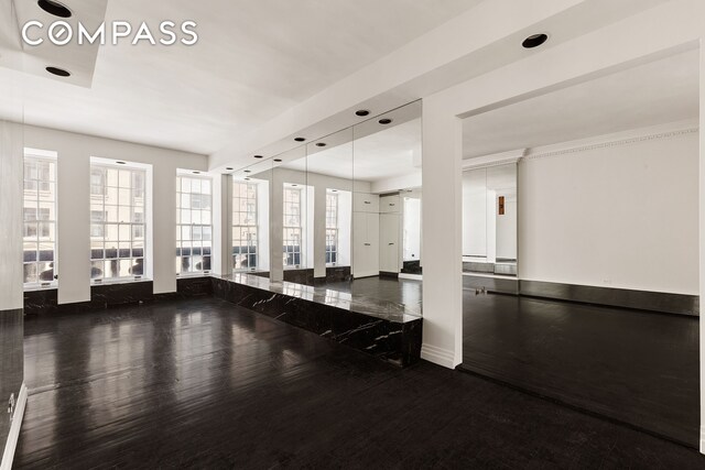 45 E 66th St Unit 4Nw, New York City, NY 10065 - workout room featuring wood finished floors