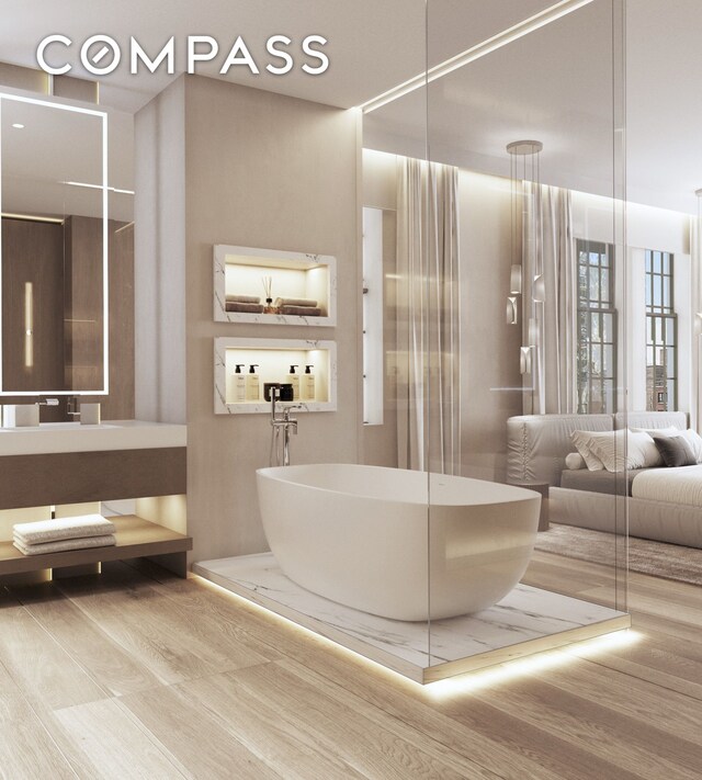 45 E 66th St Unit 4Nw, New York City, NY 10065 - full bathroom with a freestanding tub and vanity