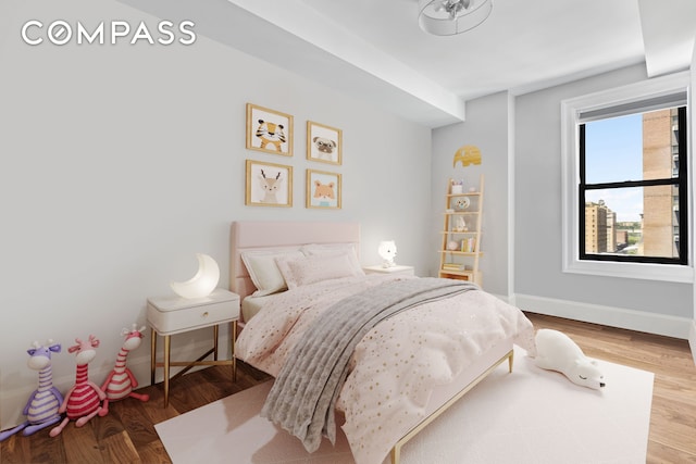 175 W 93rd St Unit 10C, New York City, NY 10025 - bedroom with baseboards and wood finished floors