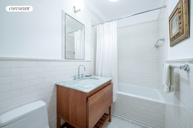 400 W End Ave Unit 13A, New York City, NY 10024 - full bath with tile walls, tiled shower / bath combo, vanity, toilet, and tile patterned floors