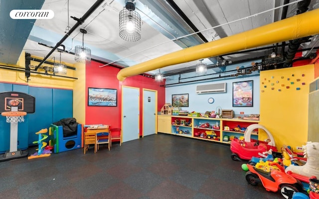 400 W End Ave Unit 13A, New York City, NY 10024 - game room with a wall mounted AC, rubber floors, and a garage