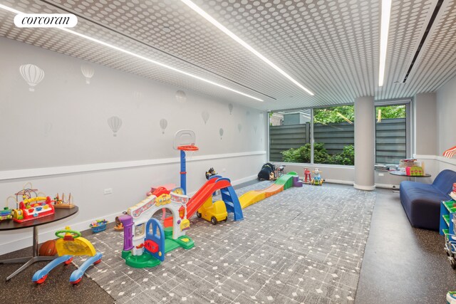 425 W 53rd St Unit 412, New York City, NY 10019 - recreation room with baseboards and visible vents